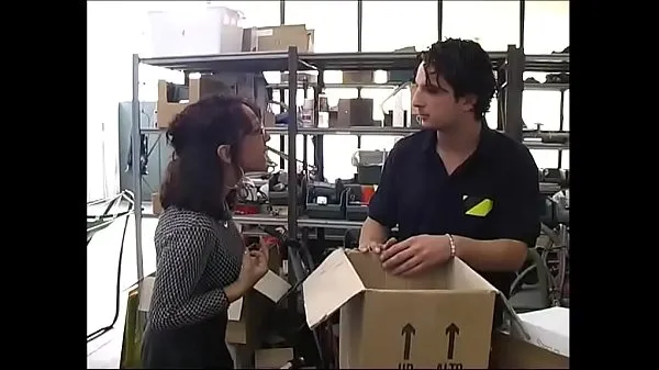 Tunjukkan Sexy secretary in a warehouse by workers Video baharu