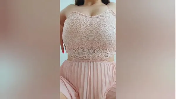 Show Young cutie in pink dress playing with her big tits in front of the camera - DepravedMinx fresh Videos